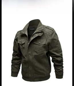 Close-up detail of military-style olive green jacket with ribbed collar and shoulder epaulettes