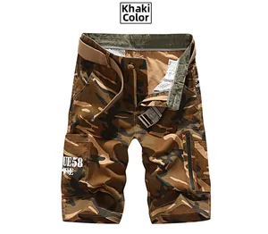 Detail of khaki camo cargo shorts with multiple utility pockets and canvas belt