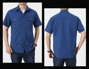 Close-up of military-style short sleeve shirt showing double stitching and pocket details