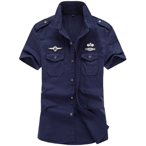 Men's navy blue military style short sleeve shirt with chest pockets and epaulettes