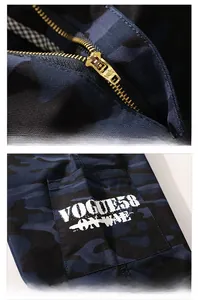 Detail of YKK metal zipper and white screen-printed lettering on camo cargo shorts