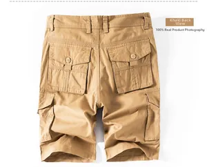 Macro view showing the durable khaki fabric and two back flap pockets with button closure