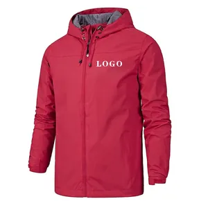 Waterproof men's outdoor jacket in brick red with adjustable hood and velcro cuffs