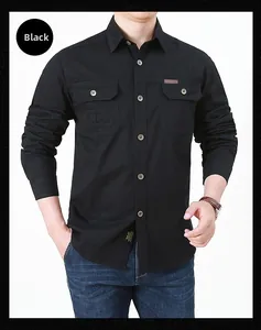Detailed view of black cotton work shirt featuring double chest pockets and woven labels