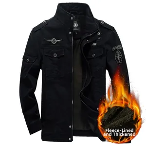 Detail of black military jacket showing thick fleece lining and airborne patch