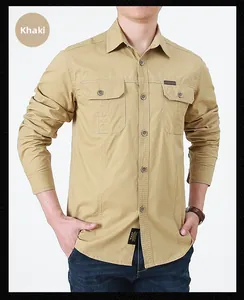Detail of khaki cotton cargo shirt featuring symmetrical buttoned chest pockets and a brand label