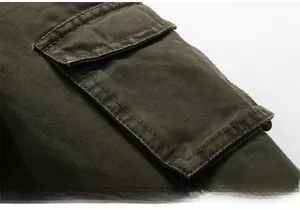 Detail of cargo pocket on heavy cotton military jacket with fine stitching