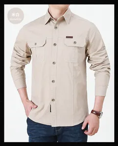 Detail of beige cargo shirt showing dual flap pockets and fine cotton stitching