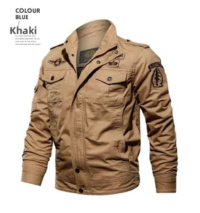 Detail of khaki military jacket with stand collar and airborne tactical patches