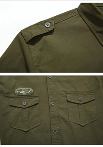 Detail view of army green tactical shirt featuring shoulder epaulets and military embroidery