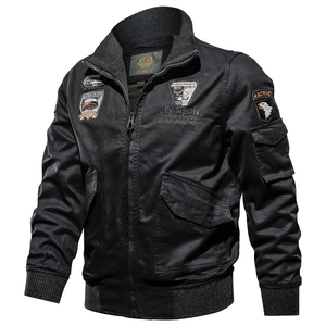 Classic men's black bomber jacket with tactical patches and a textured cotton finish