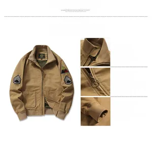 Detail view of khaki cotton work jacket with ribbed collar, metal zipper and military patches