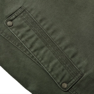 Deep olive green casual cargo jacket made of durable cotton canvas with vintage bronze buttons
