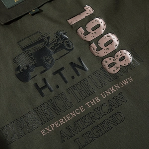 Army green military jacket featuring vintage off-road vehicle print and graphic details