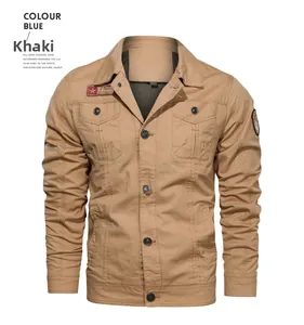 Close-up of khaki cotton military cargo jacket with embroidered patches and utility pockets