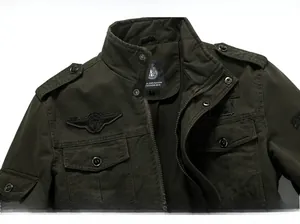 Detail showing military cotton jacket with stand collar, shoulder straps and wing badge