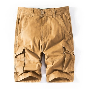 Men's khaki cargo shorts in loose fit featuring multi-pocket design and cotton twill fabric