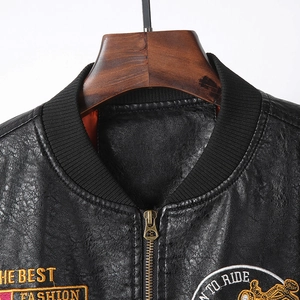 Men's black PU leather motorcycle jacket with retro embroidery and orange lining