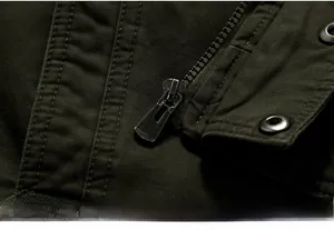 Close-up of military cotton jacket showing metal zipper and snap button details