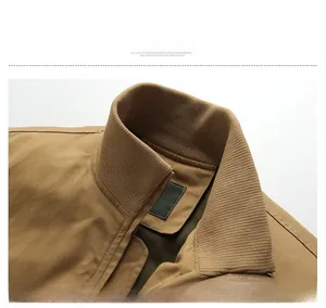 Detail view of the khaki M1942 military jacket featuring a ribbed collar and metal zipper