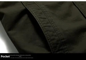 Detail of reinforced side pocket on olive green cotton military style jacket