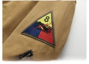 Detail of arm patch with number 8 embroidery on khaki vintage cotton pilot jacket