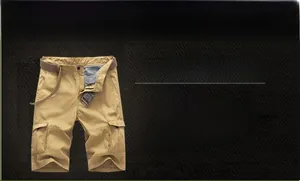 Macro shot of khaki cargo shorts featuring large side pockets and a canvas belt detail