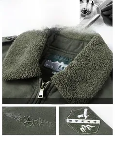 Detail der armee-grünen Bomberjacke mit Lammfellkragen und hochwertiger Adler-Stickerei