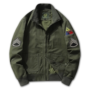 Military green M1942 flight bomber jacket with vintage embroidered patches and cargo style