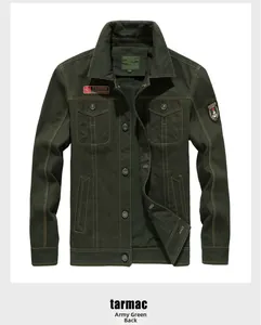 Detailed close-up of dark army green cotton canvas work jacket with utility pockets