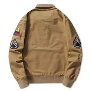 Khaki M1942 bomber jacket featuring military patches and ribbed cuffs in vintage style