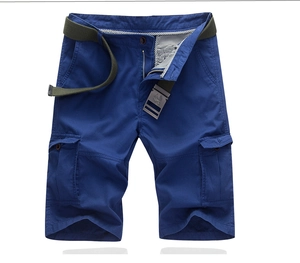 Detail view of navy cotton cargo shorts with multiple pockets and green woven belt