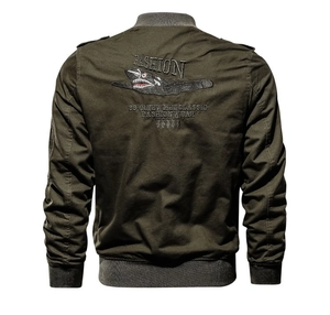 Detail of shark mouth embroidery on the back of olive green cotton pilot jacket