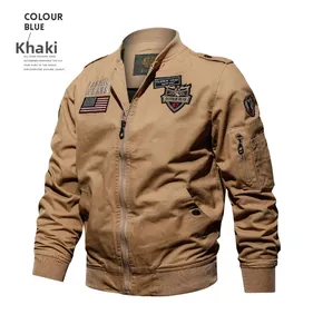 Detailed view of military khaki flight jacket with embroidered badges and zip pocket
