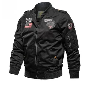 Detail of black cotton flight jacket with shoulder epaulettes and vintage patches