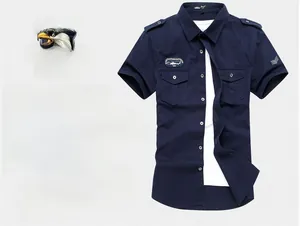 Detail of navy military shirt featuring 101st Airborne eagle patch and epaulettes