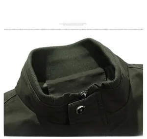 Close-up of ribbed collar and metallic zipper on army green cotton work jacket
