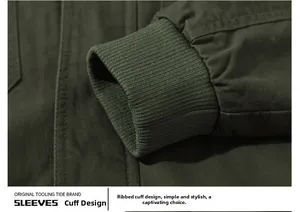 Detailed macro of elastic ribbed cuffs on a men's military green cotton canvas jacket