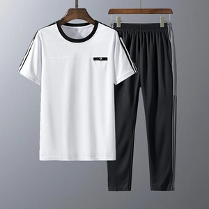Detail of men's casual sportswear set showing a crew neck t-shirt and elastic pants
