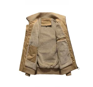Detail view of khaki cotton jacket with thick warm sherpa fleece lining and ribbed collar