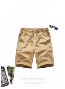 Detail of khaki cargo shorts with side pockets and elastic drawstring waistband
