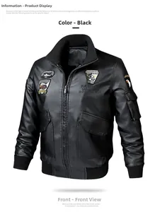 Close-up of embroidered airborne patches and hawk emblem on black faux leather jacket
