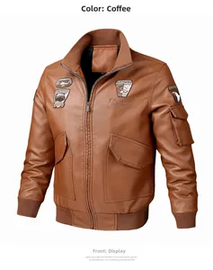 Detail of brown faux leather bomber jacket with military embroidery and ribbed cuffs