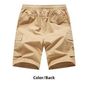 Detail of khaki cargo shorts back view with elastic waist and buttoned pockets