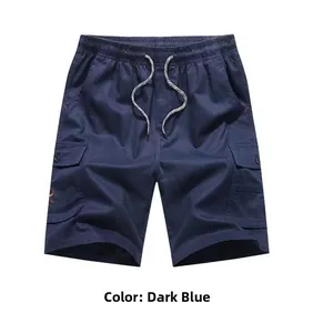 Detail of dark blue cargo shorts with large flap pocket and adjustable drawstring waistband