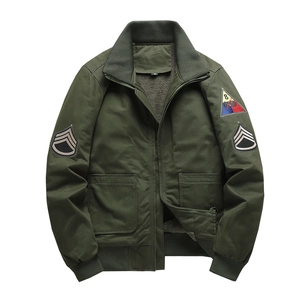 Men's green MA1 flight jacket with thick fleece lining and military patches detail