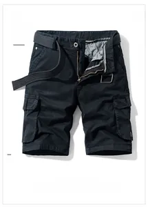 Macro shot of black cargo shorts featuring durable cotton fabric and metal zipper detail