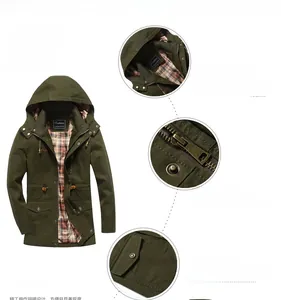 Detail view of olive green hooded jacket featuring metal zipper and plaid lining texture