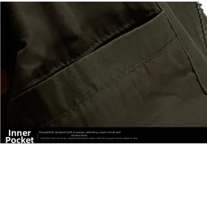 Detailed macro view of the inner pocket and double-stitch sewing on green canvas jacket
