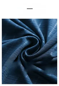 Macro shot of breathable ice silk fabric with fine horizontal texture in navy blue
